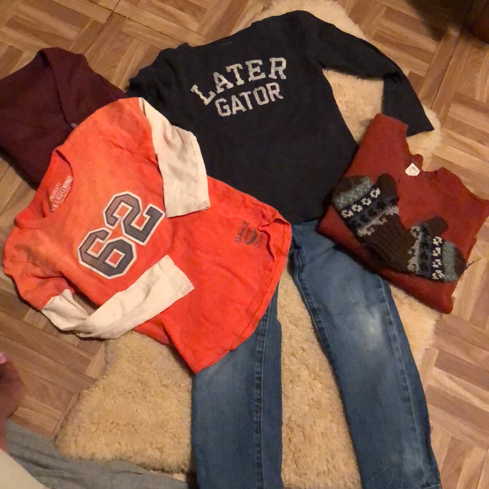 Crew cuts lot of clothing tops and bottoms.